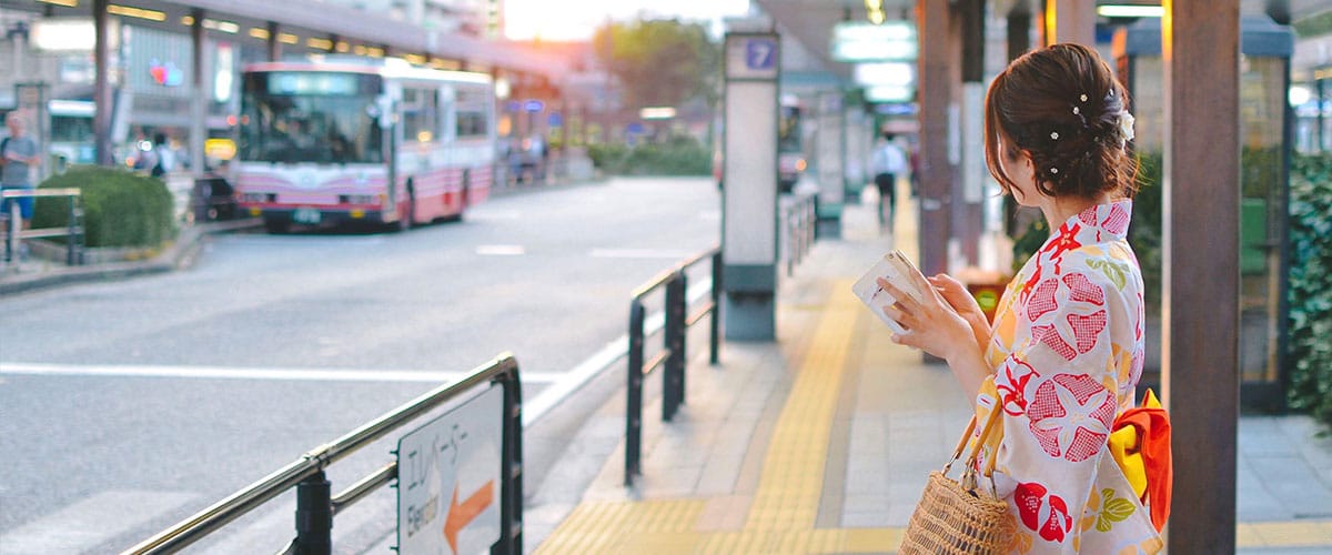 Girl waiting for the bus